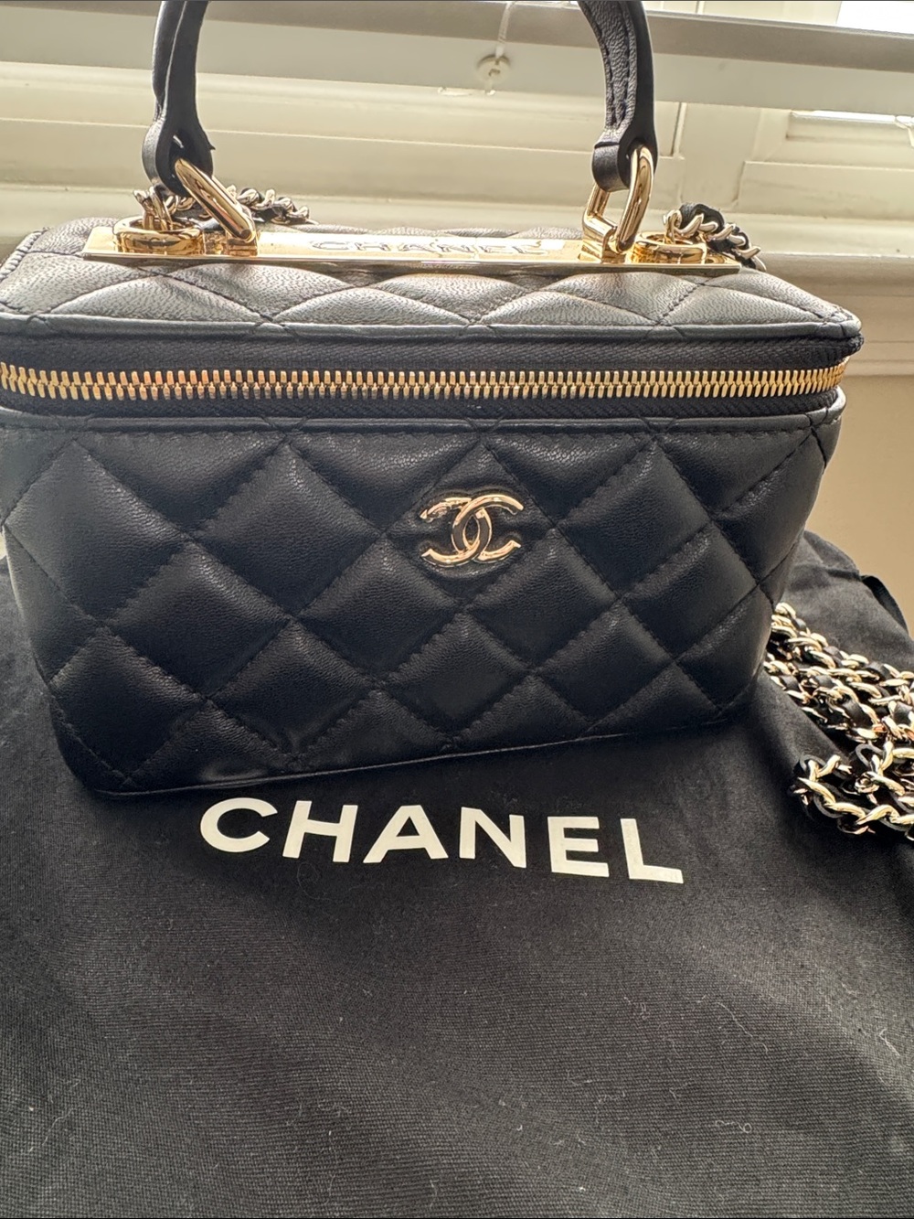 CHANEL Black Quilted Vanity Case with Gold Hardware